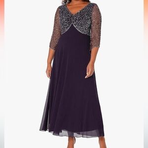 Evening gown by J Kara in black.  Size 16.